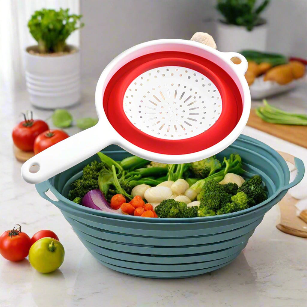 Collapsible draining basket for vegetables, made from durable silicone; features foldable design for space-saving storage, integrated handles for easy handling, and perforated base for efficient draining